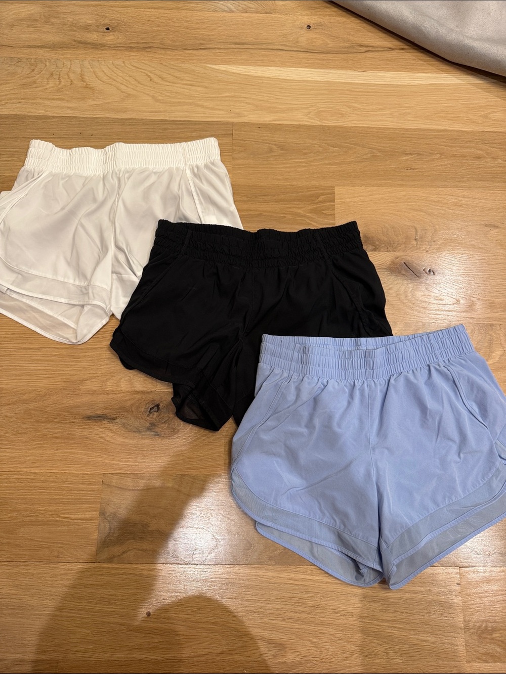 Athleta Mesh Racer 4” Women's Athletic Shorts Trio — White, Black & Light Blue